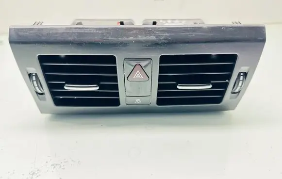 Dash center air vent grill