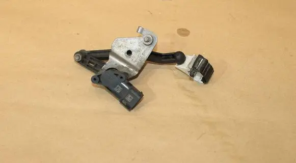 Headlight/headlamp level sensor