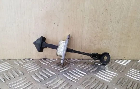 Mazda 3 I Rear door check strap stopper
