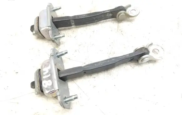 Subaru Outback Front door check strap stopper