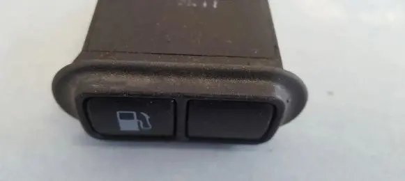 KIA Carnival Fuel tank opening switch 