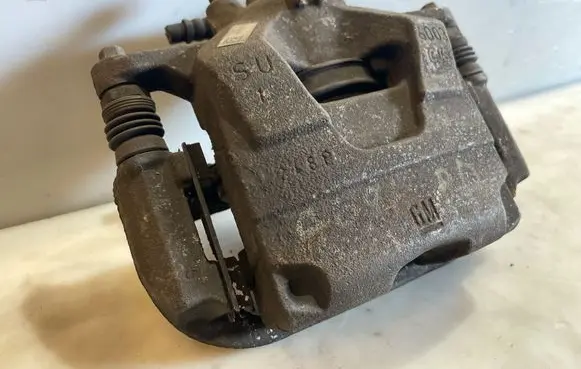 Opel Astra J Front brake caliper 13372770