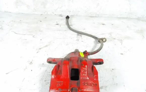 Suzuki Grand Vitara II Front brake caliper