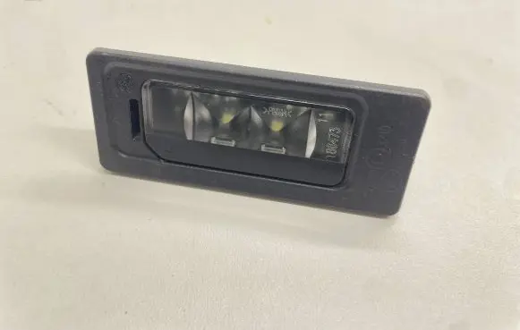 Volkswagen Golf VII Number plate light 3AF943021A