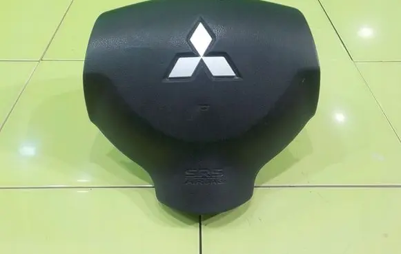 Mitsubishi Colt Steering wheel airbag 7030A217XA