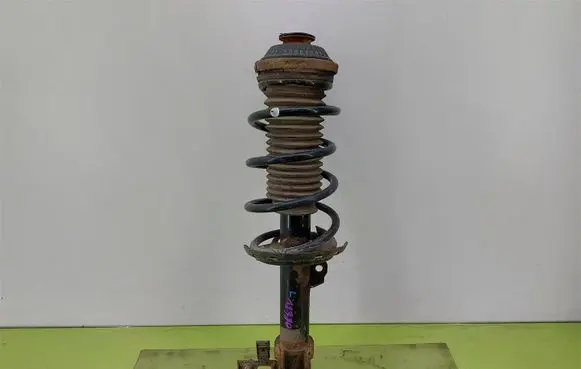 Opel Astra H Front shock absorber with coil spring 