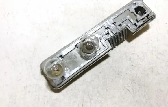 Opel Kadett E Tail light bulb cover holder
