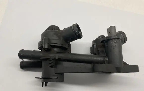Thermostat/thermostat housing