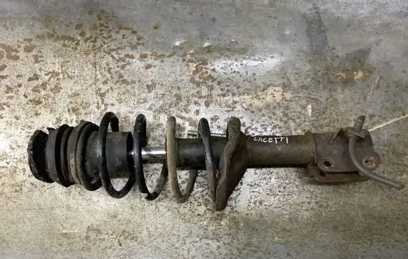 Chevrolet Lacetti Front shock absorber with coil spring 7452147
