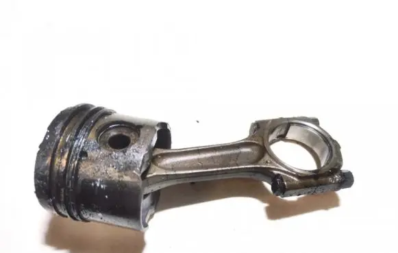 Piston with connecting rod