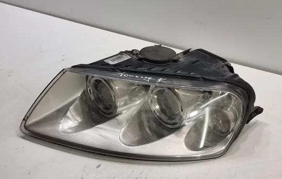 Volkswagen Touareg I Headlight/headlamp 7L6941017BG