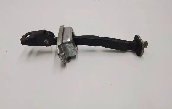 Front door check strap stopper