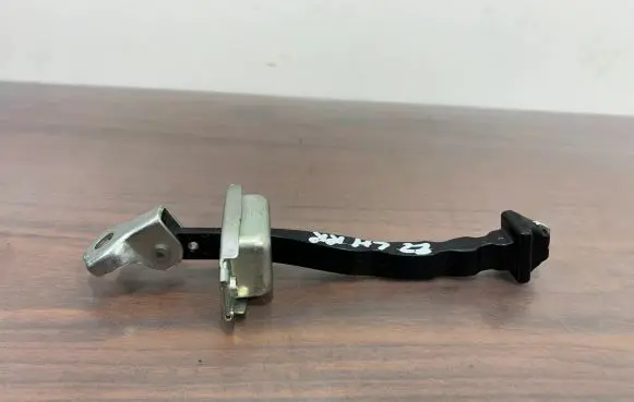 Mitsubishi Outlander IV Rear door check strap stopper