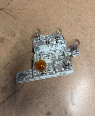 Volvo S40 Tail light bulb cover holder 28138007