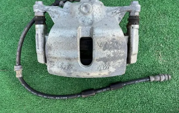 Volkswagen Golf VII Front brake caliper 5Q6DN VCF337