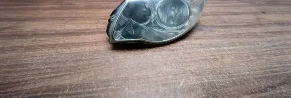 Chrysler Grand Voyager IV Headlight/headlamp 04857831AB