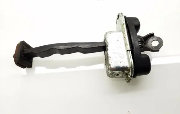 Front door check strap stopper