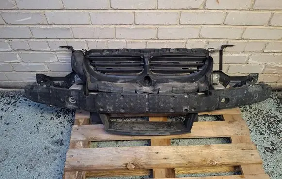 Radiator support slam panel