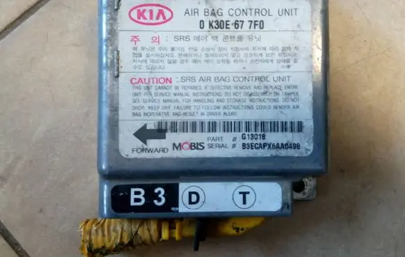 KIA Rio Airbag control unit/module 0K30E677F0 NE70115