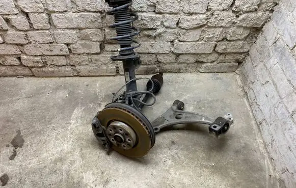 Front wheel hub spindle knuckle