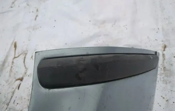 Rear bumper trim bar molding