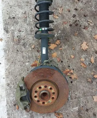 Audi Q3 8U Front shock absorber with coil spring 5N0413031AS