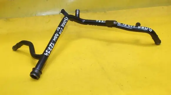 Volkswagen Golf IV Engine coolant pipe/hose 06A121065AC