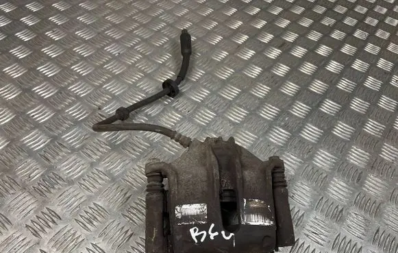 Peugeot 208 Front brake caliper 9805497780