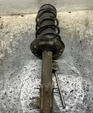 Opel Corsa D Front shock absorber with coil spring