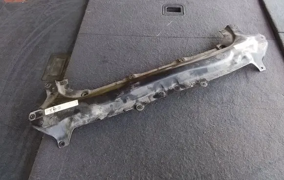 Top upper radiator support slam panel