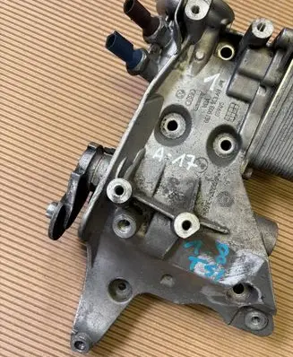 Volkswagen Jetta USA Oil filter mounting bracket 06J903143AH