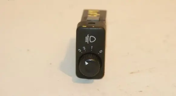 Headlight level height control switch