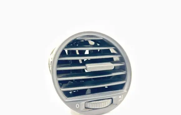 Volkswagen Caddy Dash center air vent grill 2K0819703B