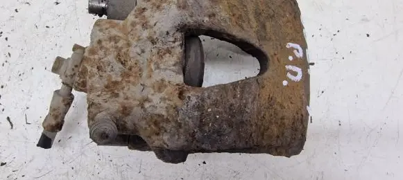 Volkswagen Golf IV Front brake caliper