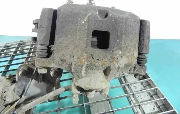 Mitsubishi Lancer VIII Front brake caliper IMPRK1114359