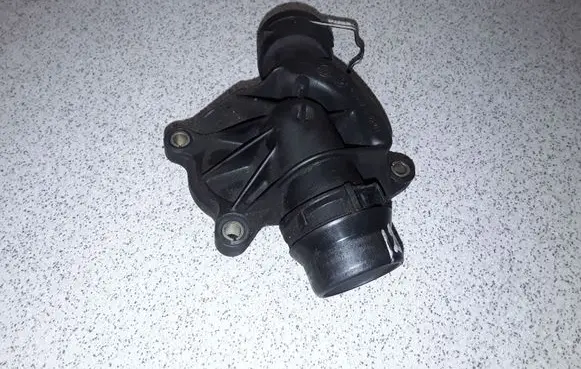 Thermostat/thermostat housing
