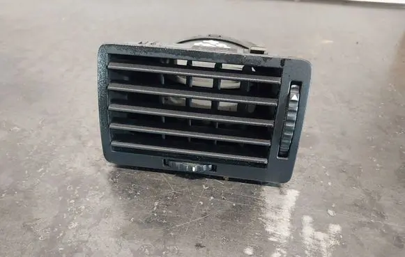 Dash center air vent grill
