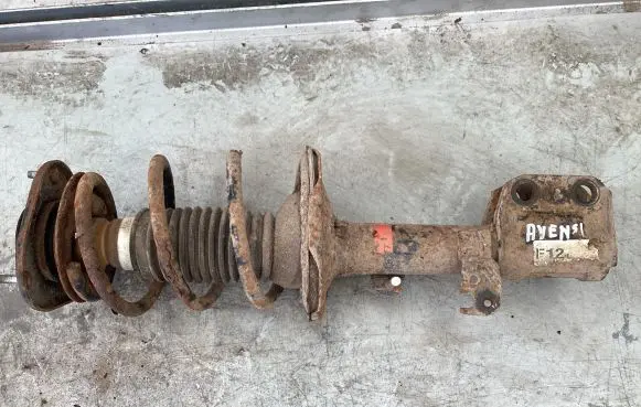 Front shock absorber with coil spring