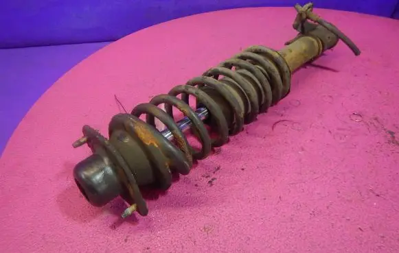 Nissan Micra Front shock absorber with coil spring