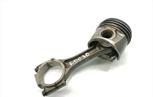 Volkswagen Golf V Piston with connecting rod 038J