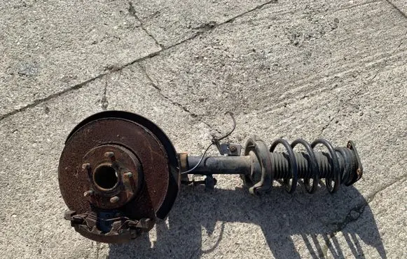 Ford Focus Front shock absorber with coil spring BV6118045ABC