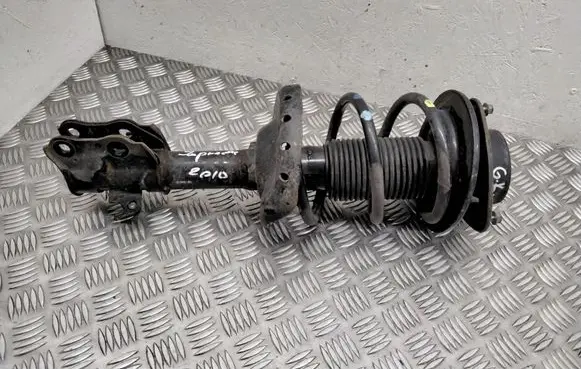 Subaru Impreza III Front shock absorber with coil spring 20310FG230