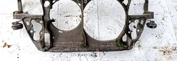 Radiator support slam panel