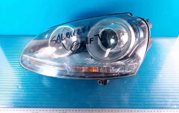 Volkswagen Golf VI Headlight/headlamp 0301212271