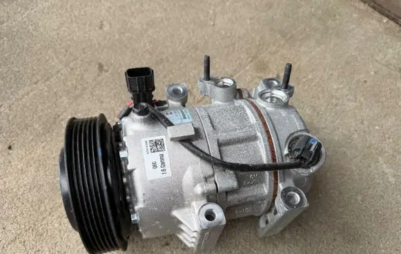 Hyundai Tucson TL Air conditioning (A/C) compressor (pump) 97701D7600