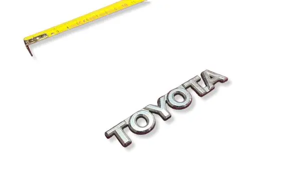 Toyota Yaris Rear door emblem/model letters MMIX343