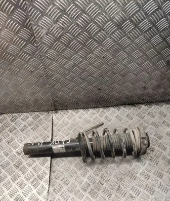Volkswagen Caddy Front shock absorber with coil spring
