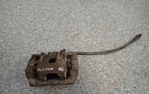 Hyundai Tucson JM Front brake caliper
