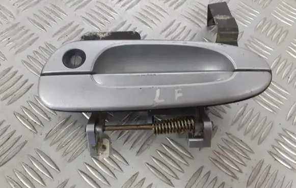 Mazda 626 Front door exterior handle BRAK