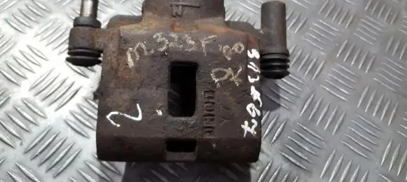 Mazda 323 F Front brake caliper